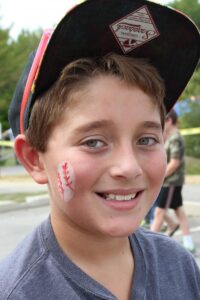 smiling boy at 2nd annual community celebration