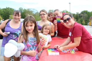 group of smiling people at 2nd annual community celebration