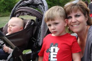 woman and two young children at 2nd annual community celebration