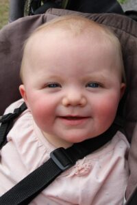 baby in stroller at 2nd annual community celebration