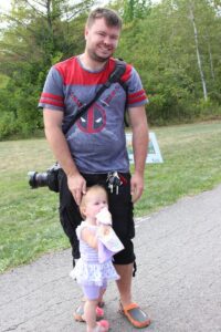 father and young daughter at 2nd annual community celebration