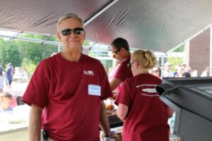 volunteers preparing food at 2nd annual community celebration