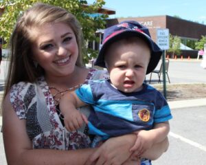 girl and baby at 2nd annual community celebration