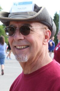 maintenance man smiling at 2nd annual community celebration