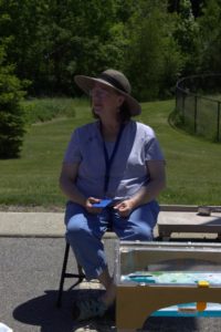 woman in sunhat at 3rd annual community celebration