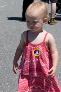 young girl in dress at 3rd annual community celebration