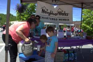 neighborworks booth at 3rd annual community celebration