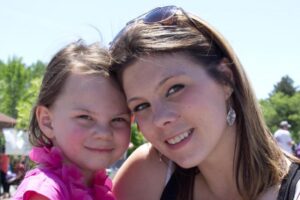 woman and young girl at 3rd annual community celebration