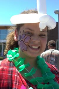 girl with face paint at 3rd annual community celebration