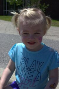 young girl at 3rd annual community celebration