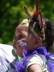 young girl with cupcake facepaint at 3rd annual community celebration