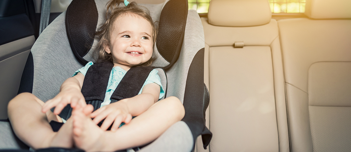 baby girl in car seat in maine