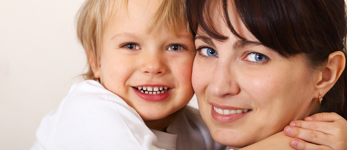 happy child hugging his mom